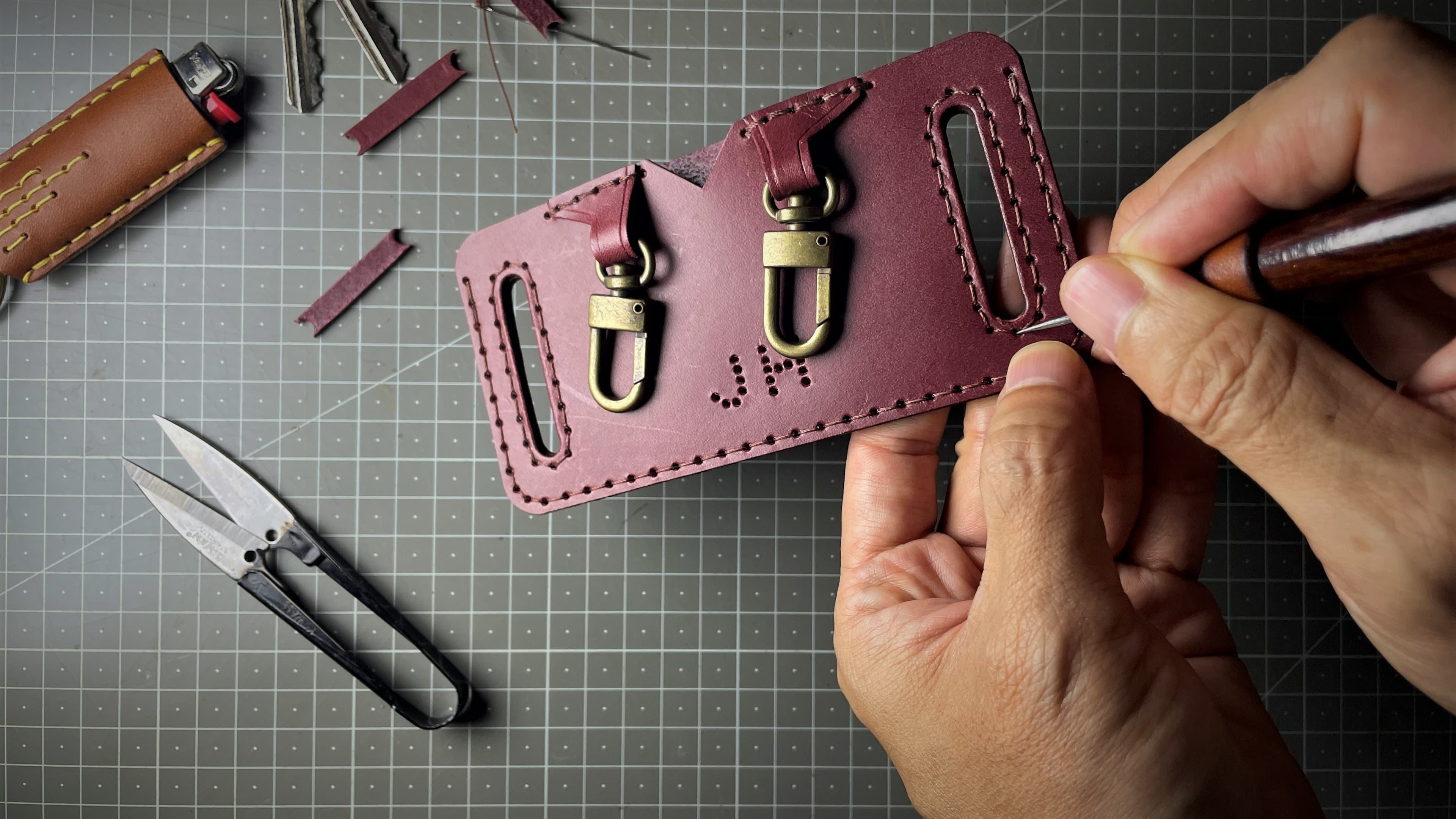 Hand stitching leather components during prototype testing