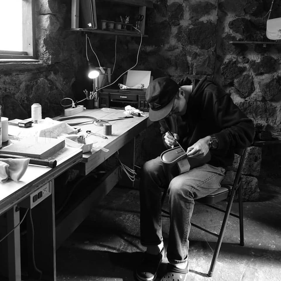 Leather artisan working in the Pattern Factory Wind studio
